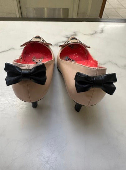 I Heart beige chihuahua puppy themed kitten heels featuring a dog face applique on the toe and black bows on the back.
