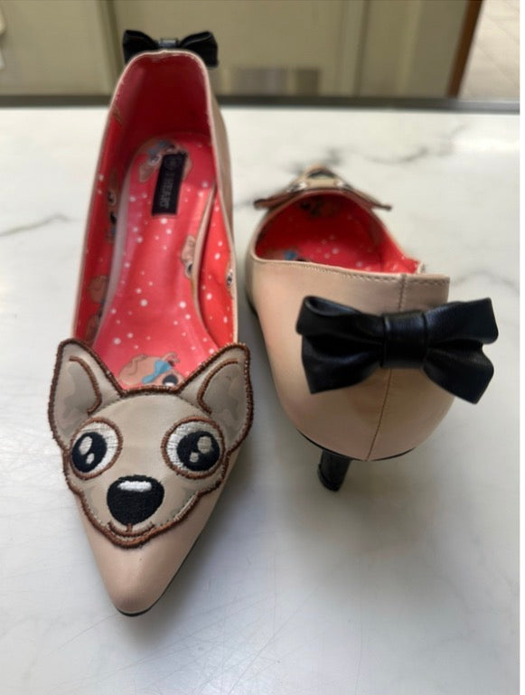 I Heart beige chihuahua puppy themed kitten heels featuring a dog face applique on the toe and black bows on the back.