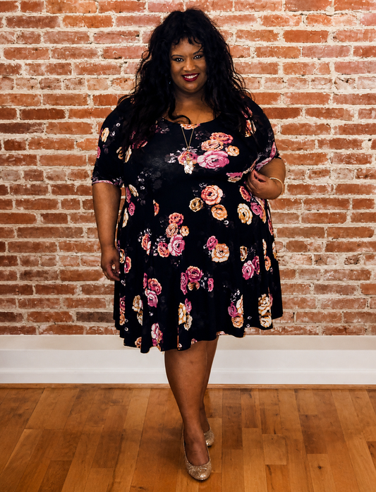 Size 2x (22) Torrid 3/4 sleeve dress in torrid studio knit in black with floral pattern.