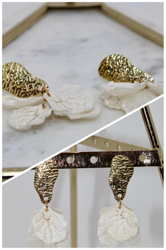 Gold and white leaf like earrings