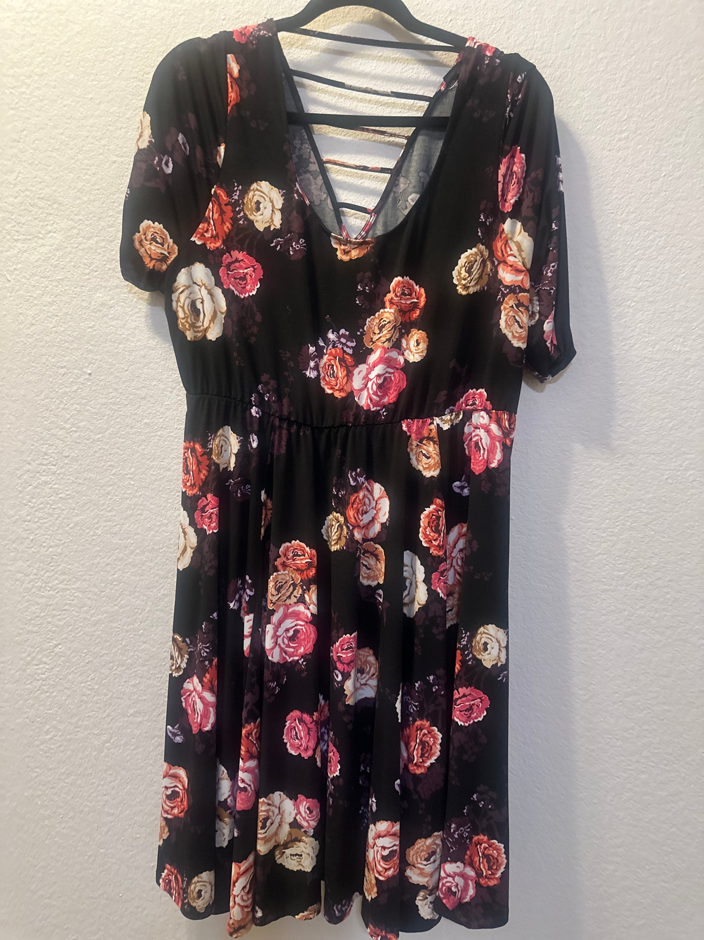Size 2x (22) Torrid 3/4 sleeve dress in torrid studio knit in black with floral pattern.