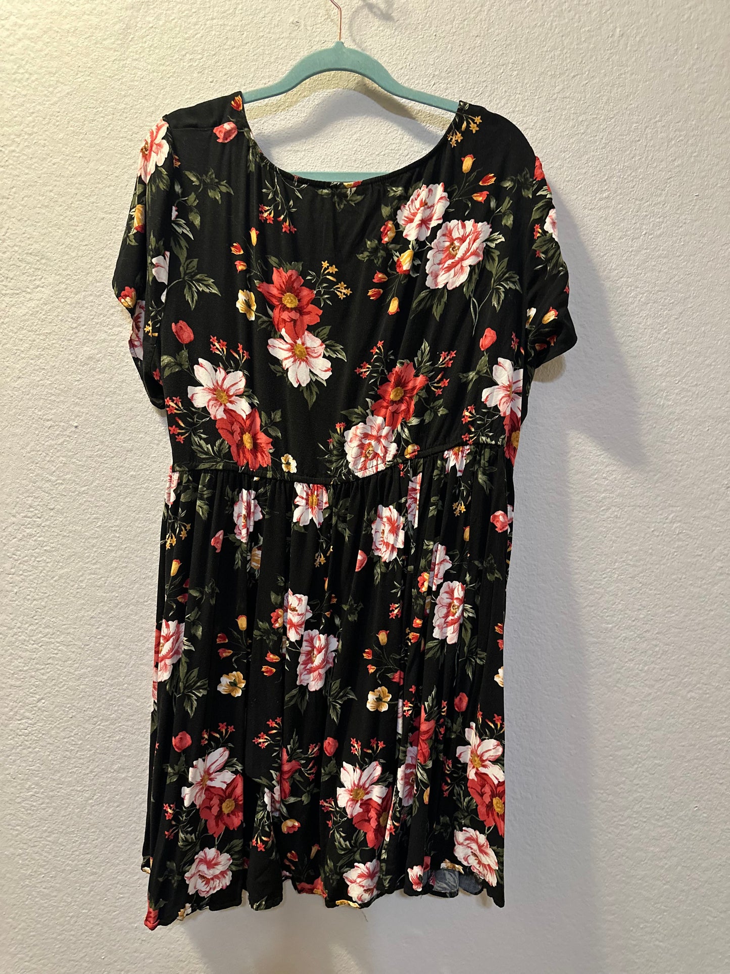 Size 4x (26) Torrid black and red floral print flutter sleeve babydoll dress.