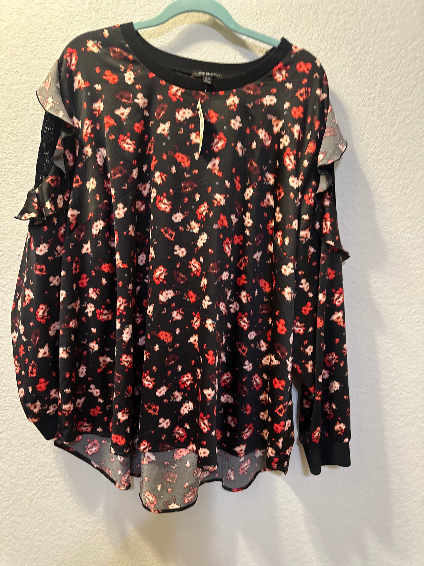 Size 4x/5x (26/28) Lane Bryant multi-color floral pattern, cold-shoulder ruffles, and lace shoulder insets.