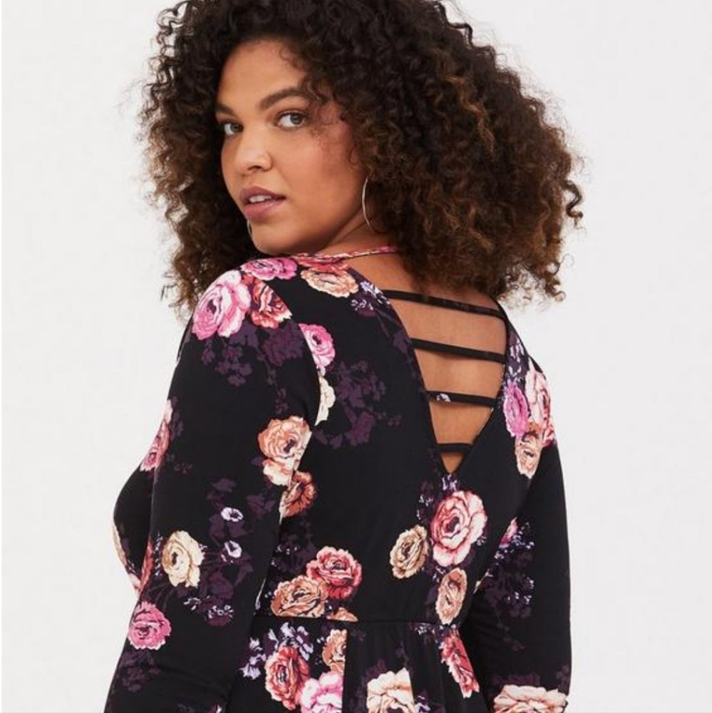 Size 2x (22) Torrid 3/4 sleeve dress in torrid studio knit in black with floral pattern.