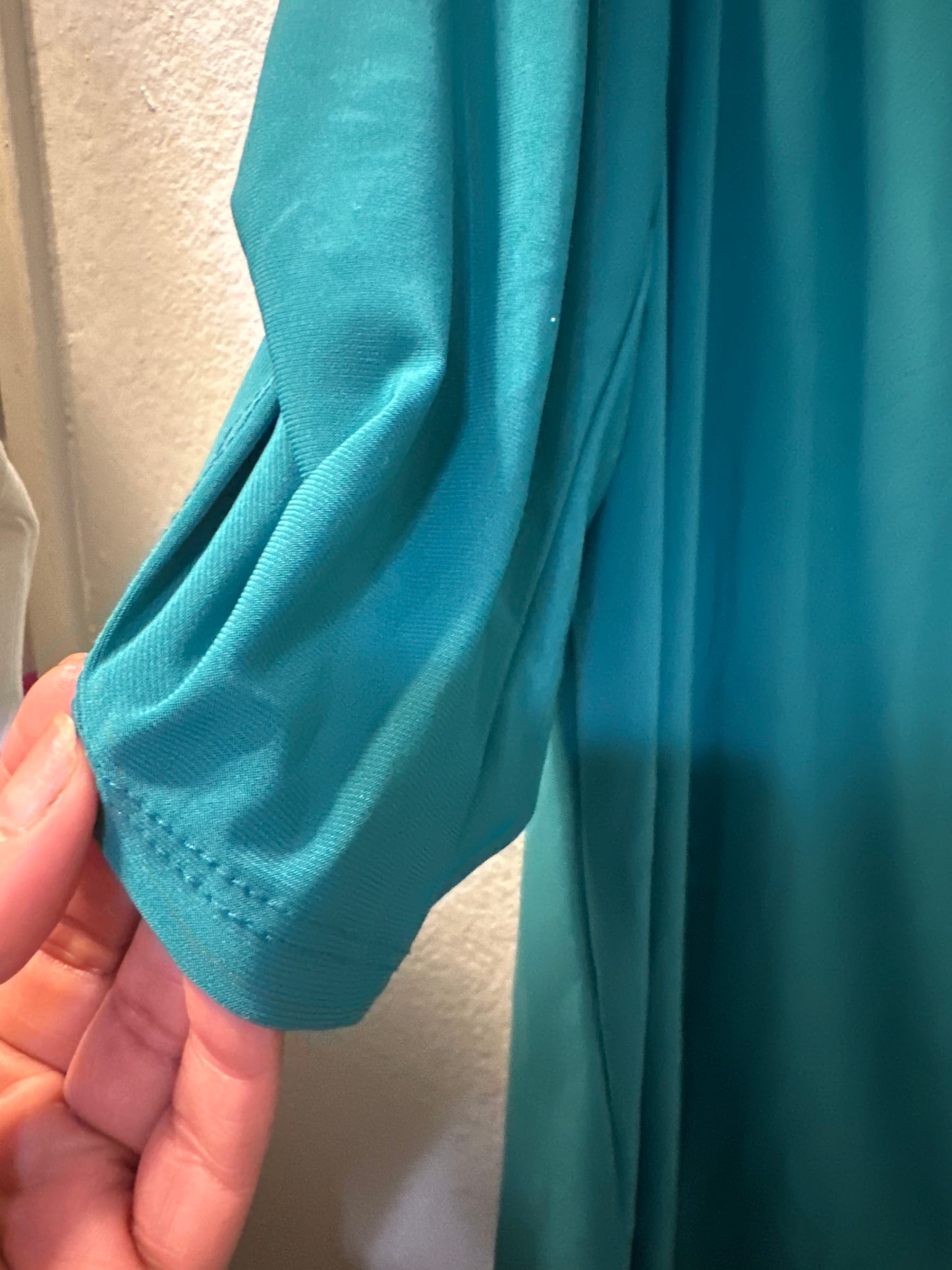 Size 3x (24) three-quarter length green blouse with faux buttons