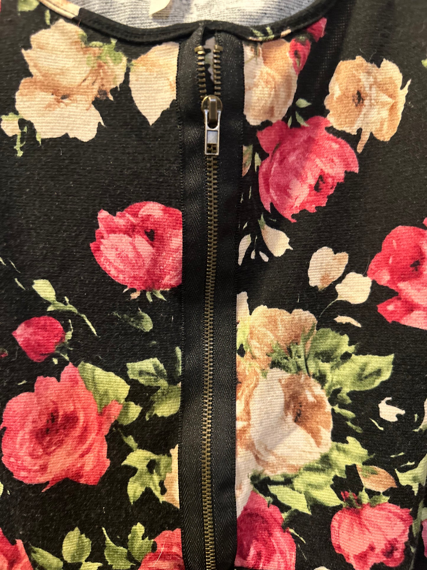 Size 3x (24) black, and floral peplum top with zipper detail