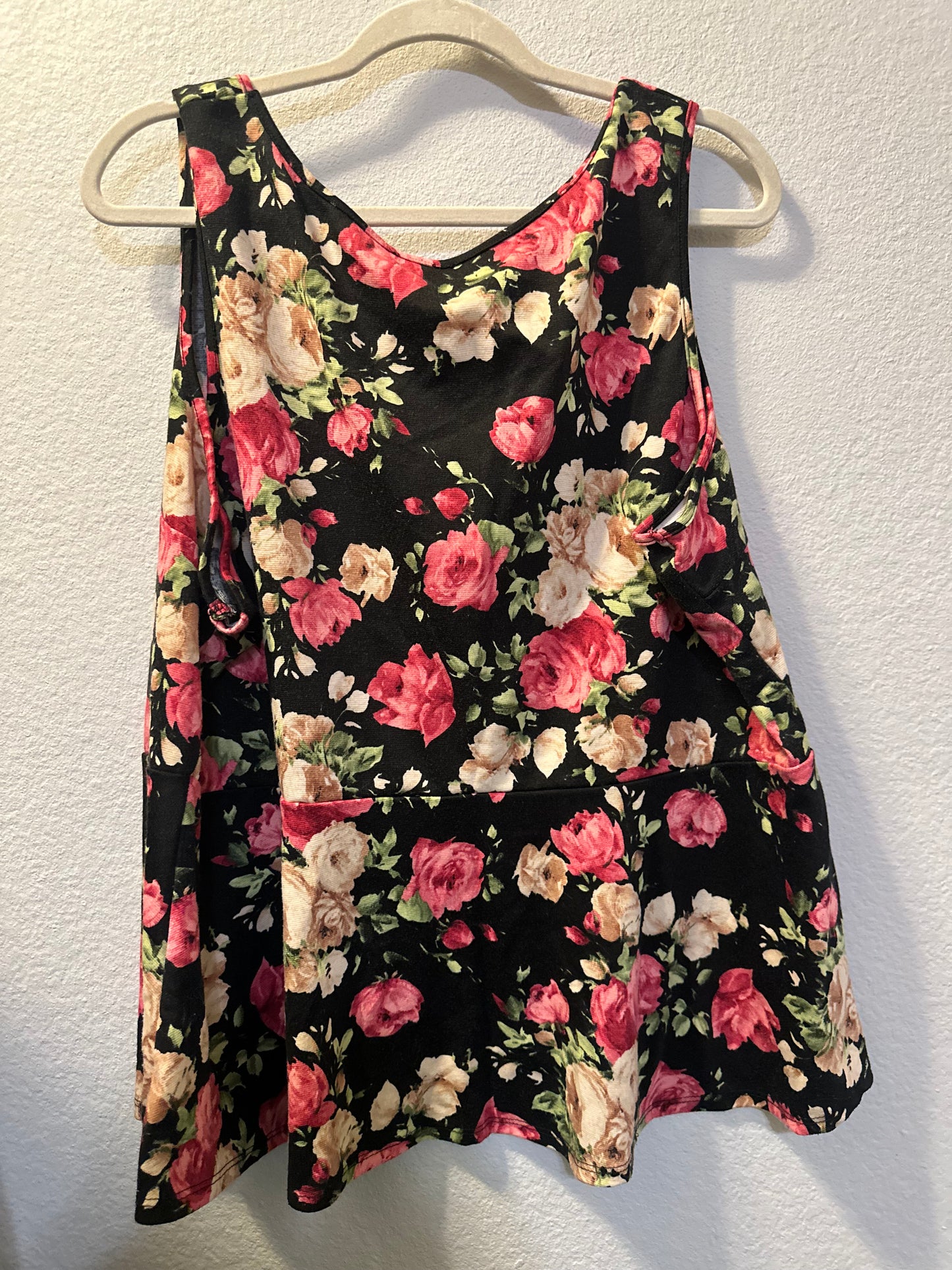 Size 3x (24) black, and floral peplum top with zipper detail
