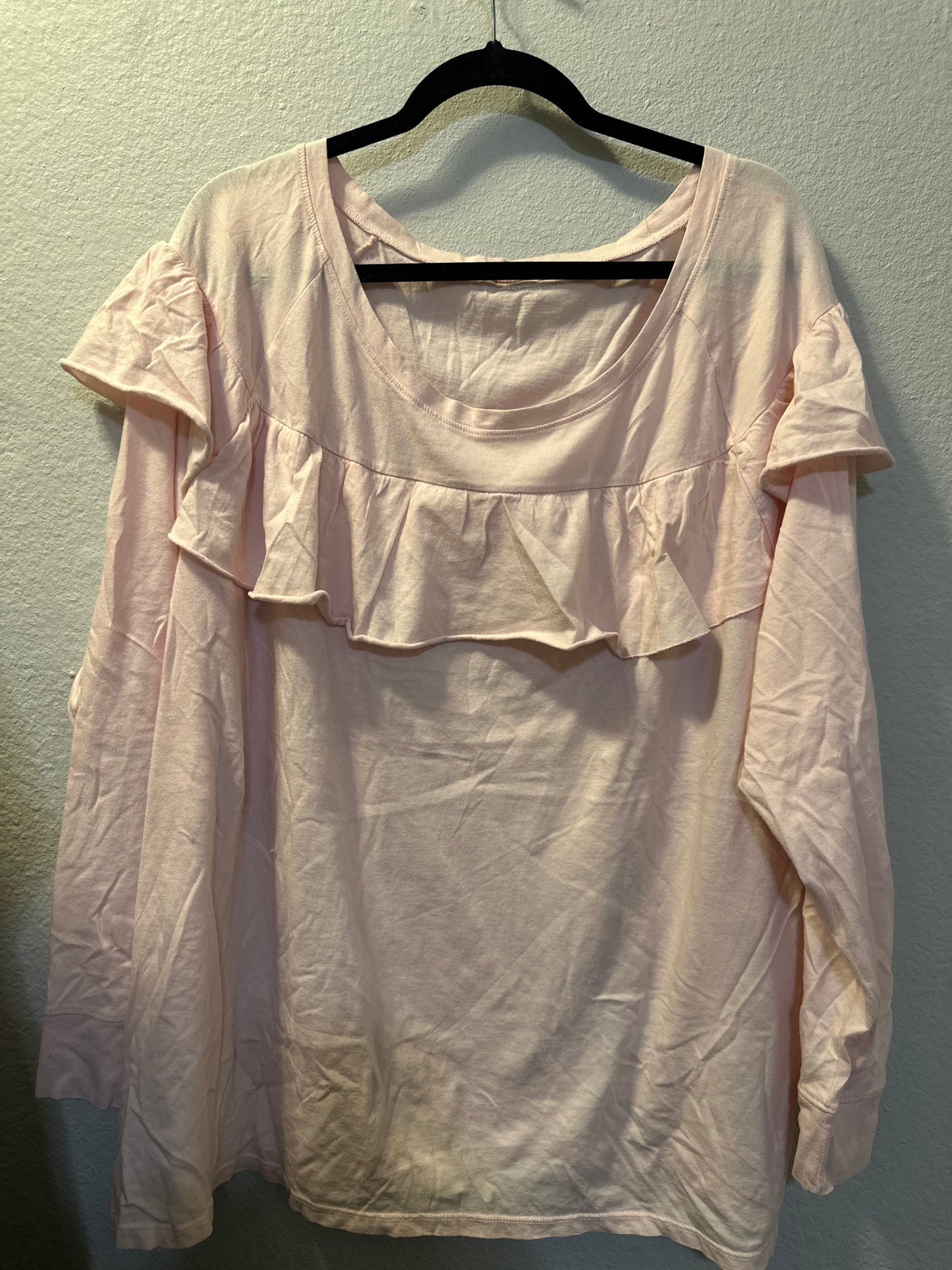 Size 4x/5x (26/28) Lane Bryant pink knit long-sleeve top featuring a ruffle yoke design.