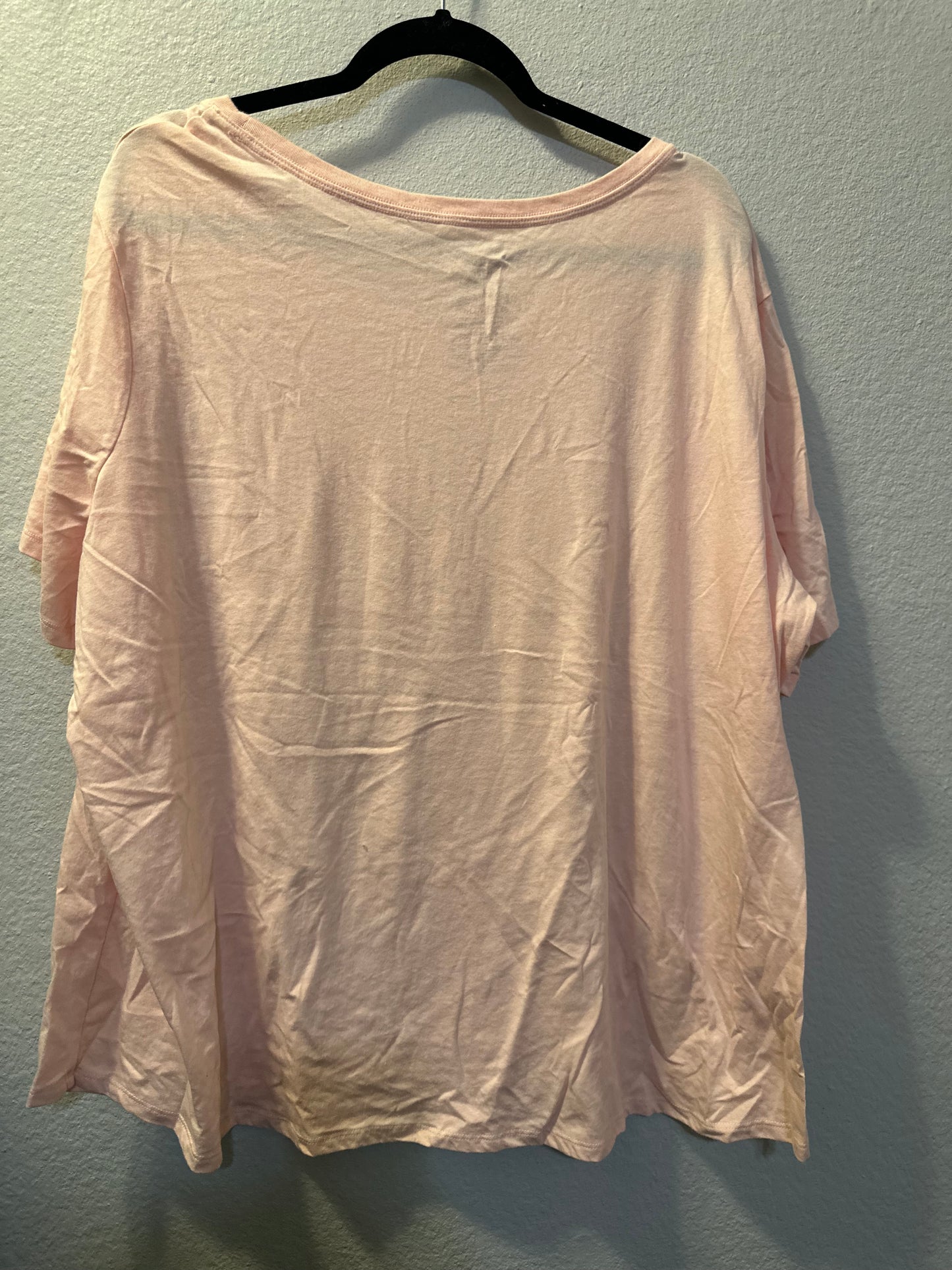 Size 4x/5x (26/28) Lane Bryant pink knit long-sleeve top featuring a ruffle yoke design.